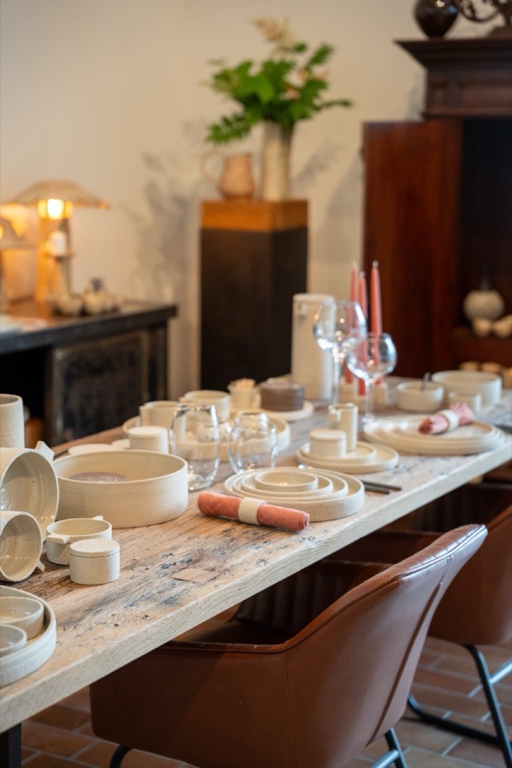 A table set with Lies Bulteel's handmade tableware